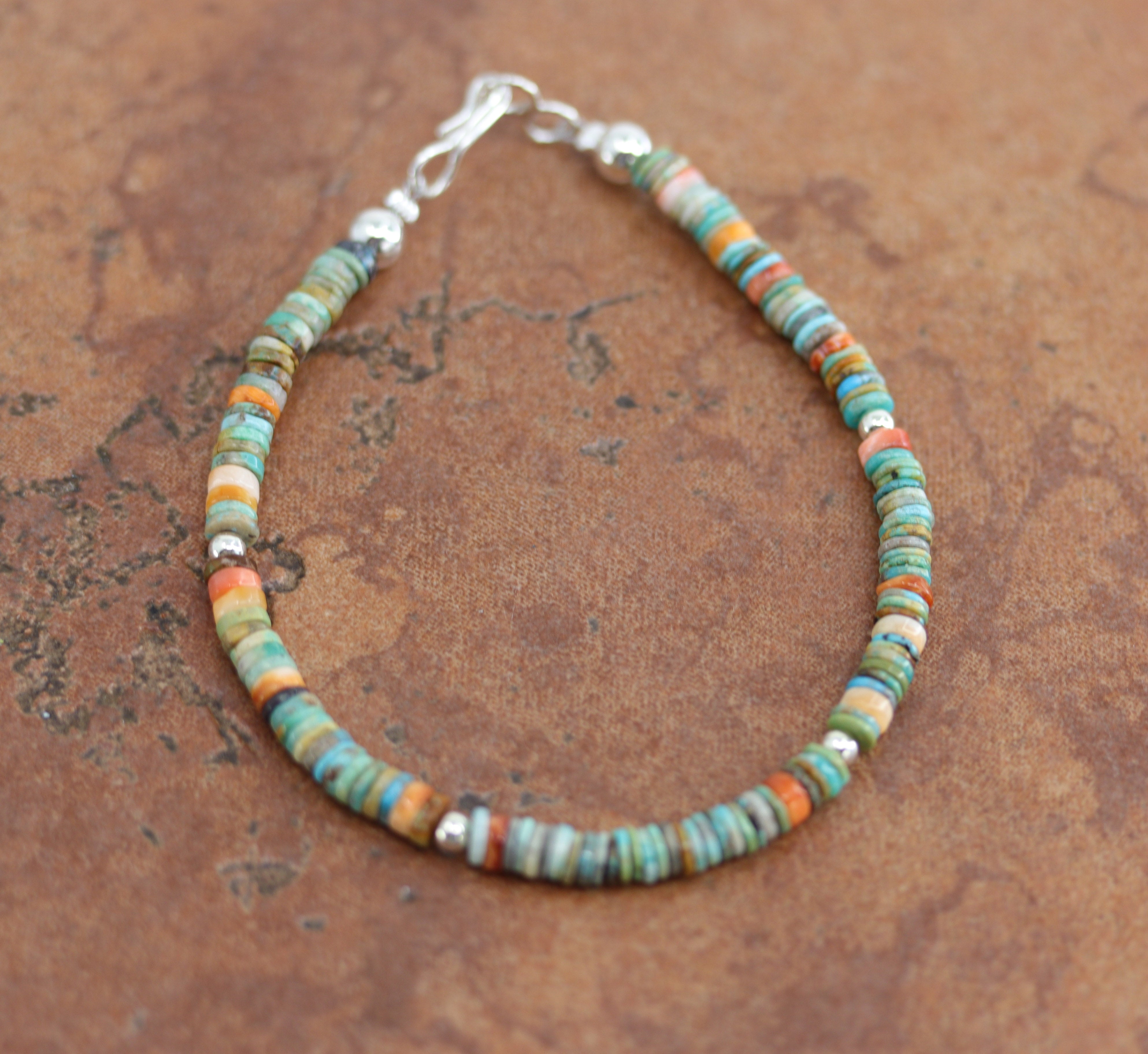 A beautiful Navajo Style bracelet. It is about 7 1/2" from end to end and 3/16" wide.&nbsp;