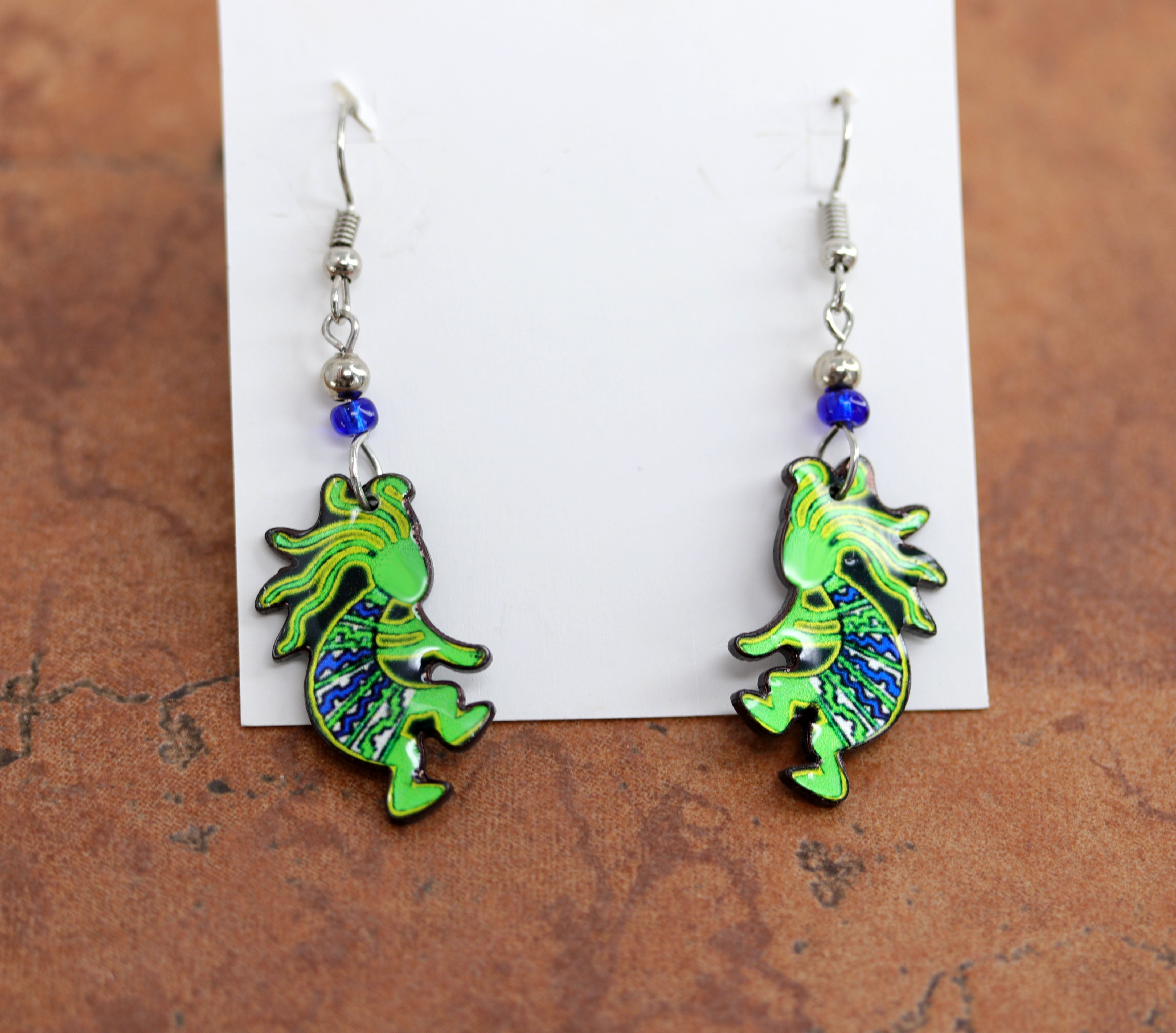 The hooks are made from Zinc Alloy. The earrings are about 2 3/8" in length including the hook, and 5/8" in width.